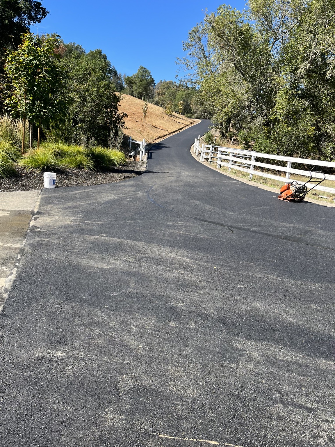 Fresh asphalt driveway paving