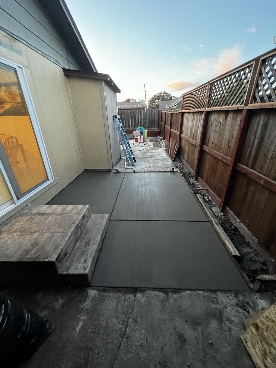 Fresh concrete walkway installation